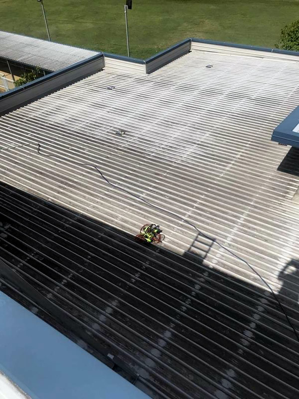 Commercial Building Roof Cleaning Before